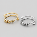 Anillo de acero inoxidable  bolas dorado y plateado